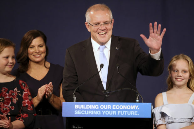 Australia government says it won't break tax cut pledge