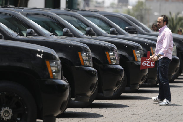 Mexico auctions seized vehicles outside presidential mansion
