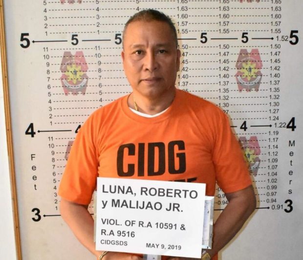 Surigao del Sur town mayor arrested for possession of guns, explosives, drugs
