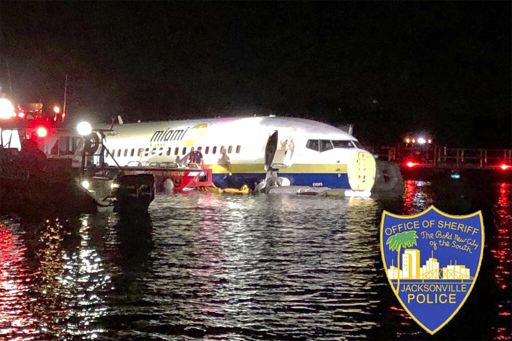 Plane crashes into Florida river at end of runway, no deaths
