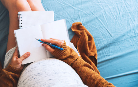 pregnant woman, studying