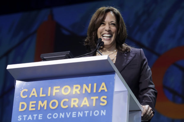 With Biden absent, his rivals pounce at California gathering