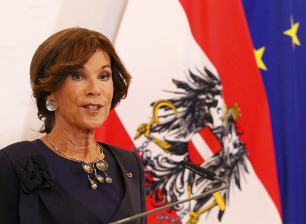 Austria swears in first female chancellor, pledges stability