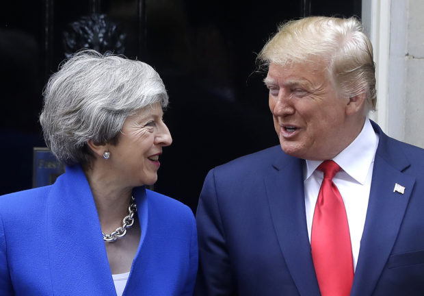  Trump eases up, makes nice with May before she steps down