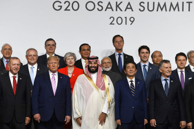 G-20 leaders clash over values, face calls to protect growth