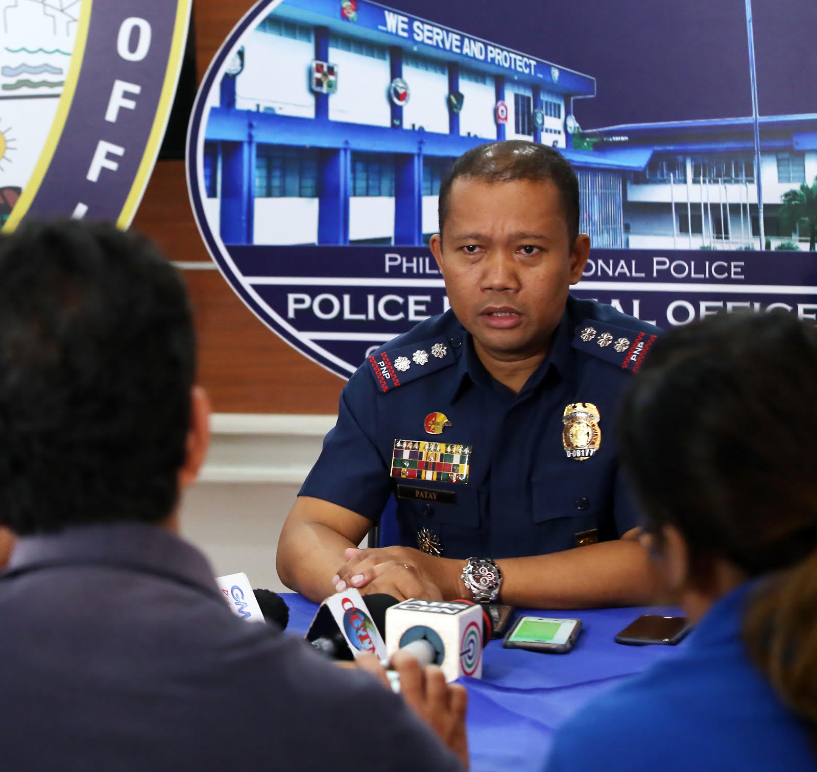 P/Col. Lito Patay, chief of the Criminal Investigation and Detection Group in Central Visayas, answers questions from the media regarding Organico Agribusiness Venture, one of the alledged investment scam in Cebu. Photo by JUNJIE MENDOZA