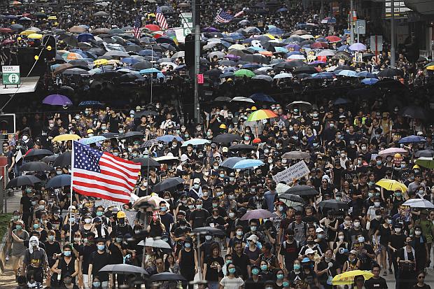 Hong Kong protesters carrying US flags