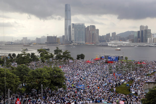  Hong Kong protesters block roads before handover ceremony
