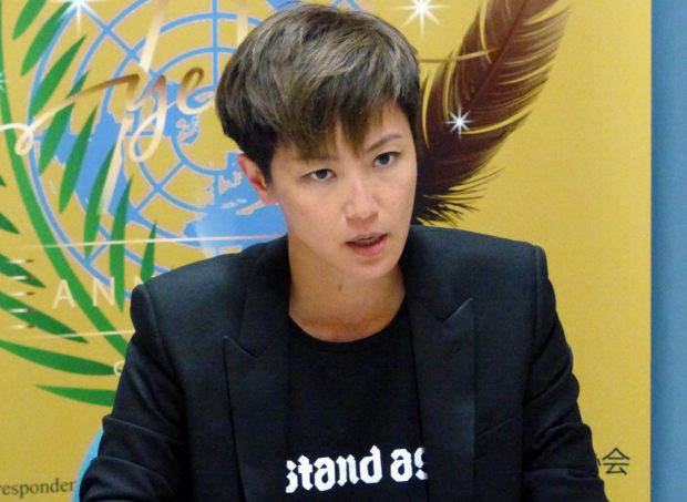  Activist Hong Kong singer faces down China at UN rights body   Associated Press
