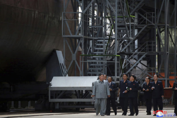 Kim inspects new sub, wants North Korea's military bolstered