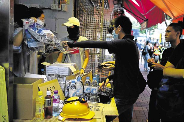 Gas masks, hard hats HK bestsellers