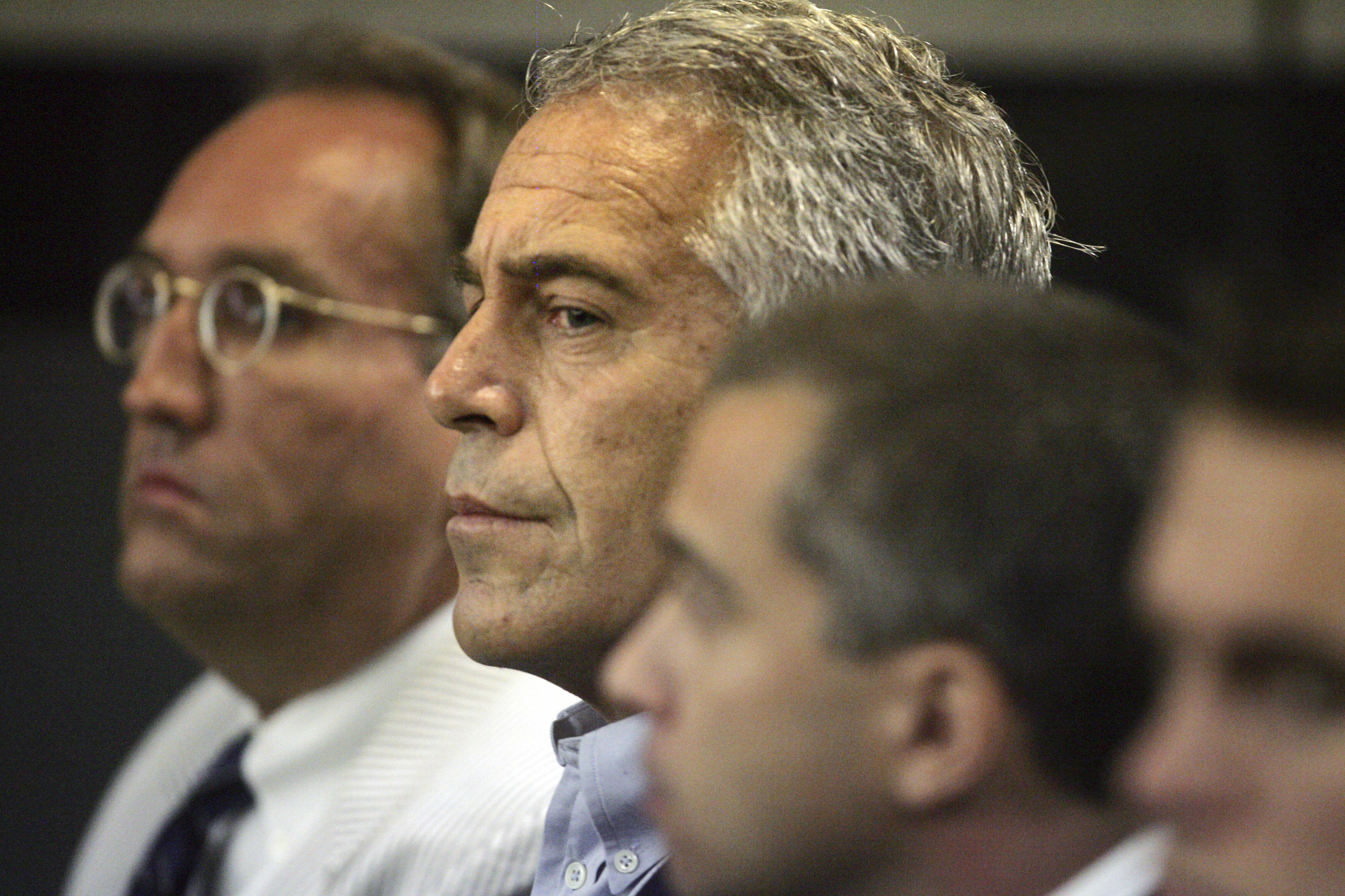 Questions swirl around Epstein's monitoring before suicide