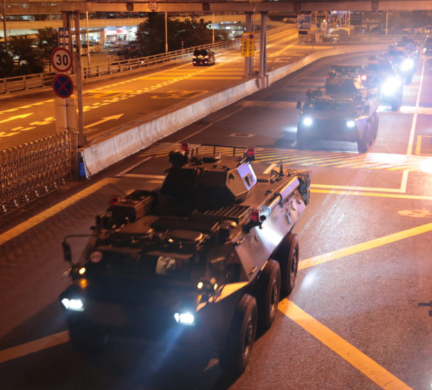 China rotates new troops into Hong Kong amid mass protests