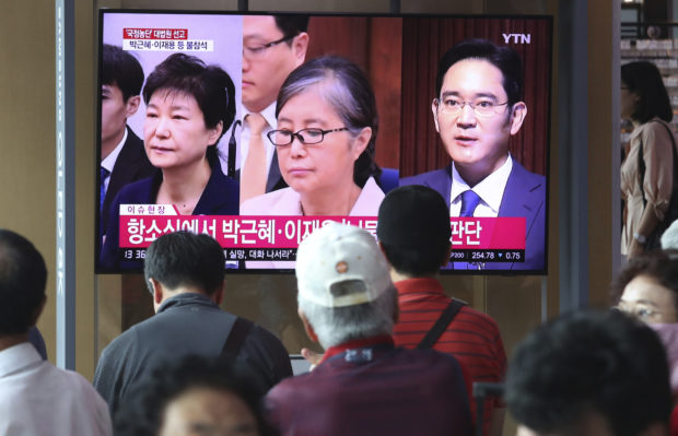 South Korean court sends Park, Samsung heir cases to new trials