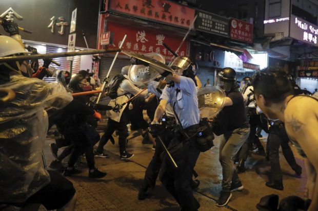 Lawmakers on each side blame the other in Hong Kong protests