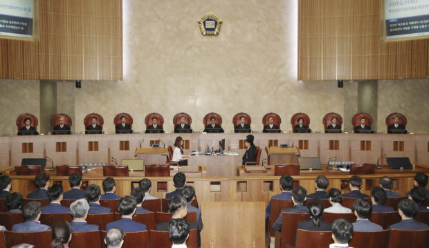 South Korean court sends Park, Samsung heir cases to new trials