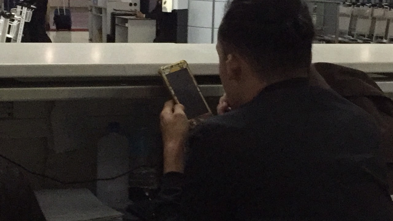 Airport personnel caught using smartphones while on duty
