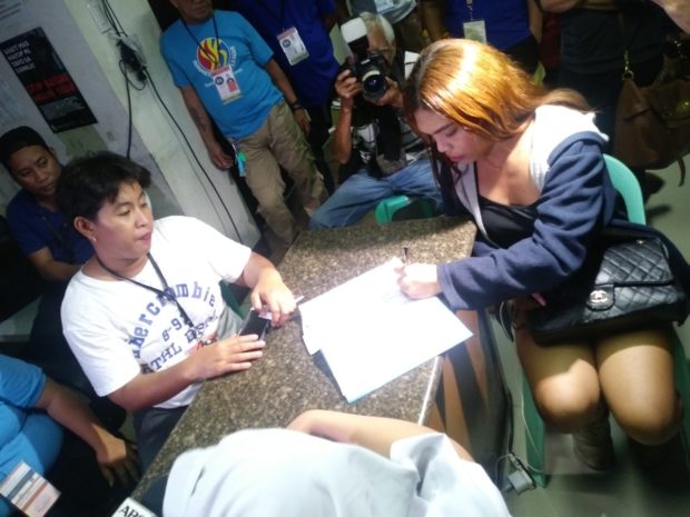 GENDER ISSUES - Transgender woman Gretchen Diez was turned over to Quezon City police station-7 after she was barred from entering a women's comfort room in Quezon City. (Photo courtesy of QCPD Public Information Office)