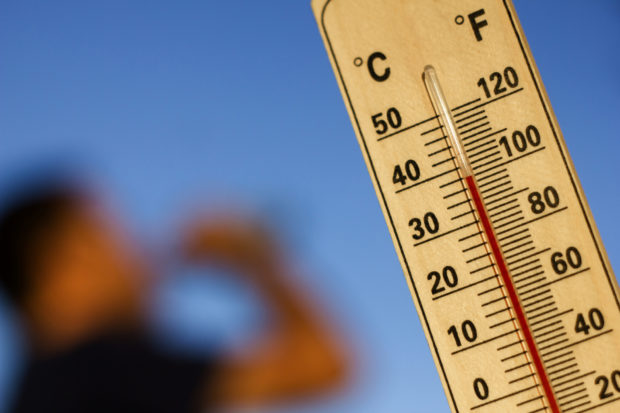 Thermometer stock photo. STORY: Meteorologists not spared by climate change deniers