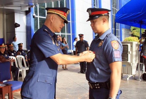 cop conferred award in viral foot chase manila