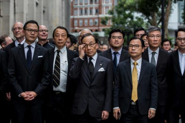 Hundreds of Hong Kong lawyers join silent march to demand inquiry into protests