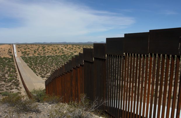 Smuggler drops two young kids over US-Mexico border wall
