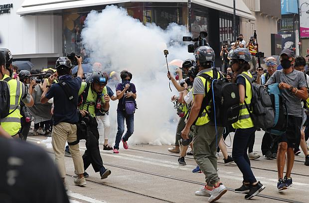 Hong Kong police use teargas on protesters