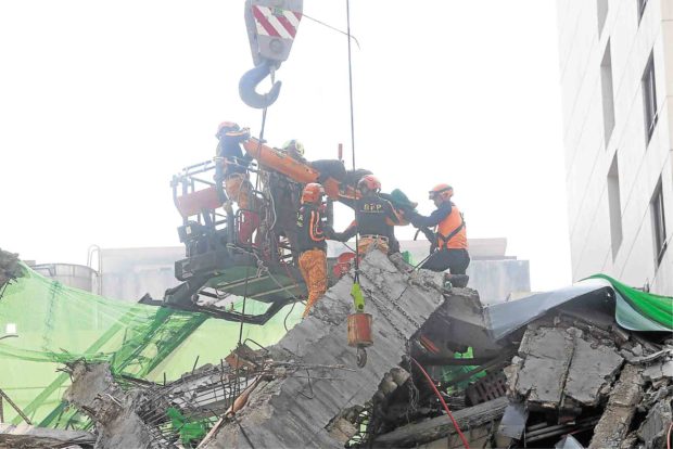 2 laborers dead, 1 hurt as budget hotel collapses