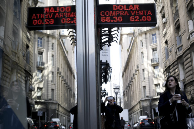  Restrictions on hard currency take effect in Argentina.