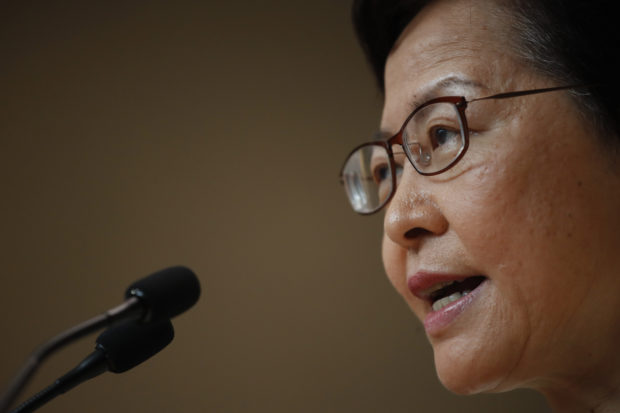  HK leader Lam says she hasn't resigned because it's easy way out