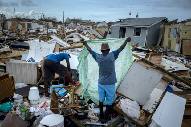  Survivors on Bahamas island mark time as officials lay plans