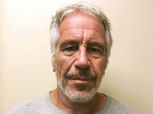  Woman sues Epstein estate, saying she was abused at age 14