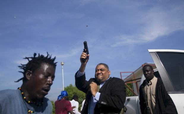  AP photographer wounded as senator fires gun during protest