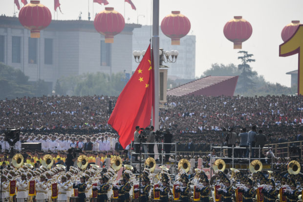 A Chinese former top security official faces life in jail after a court hit him with a suspended death sentence for bribery and other crimes.