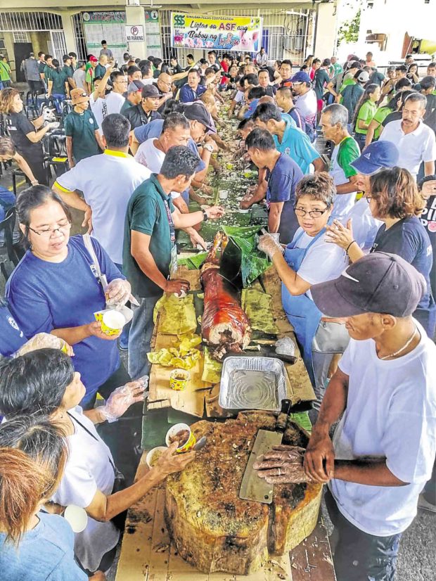 ‘Lechon’ feast held in Laguna to ease fears of swine fever