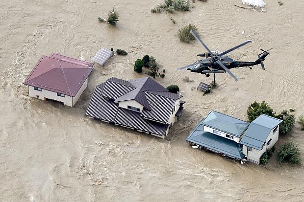 Japan Self-Defense Force chopper over flooded area