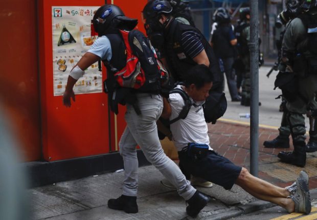 Hong Kong students decry police shooting of teen protester