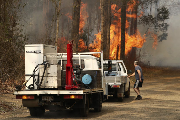 Wildfires destroy up to 30 homes in eastern Australia