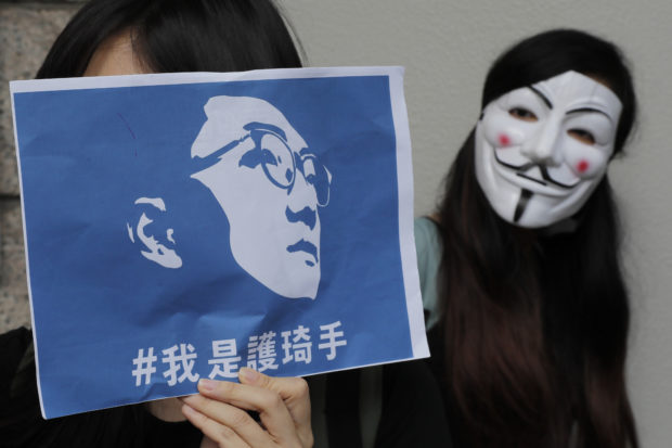 Hong Kong protesters clamor for release of detained activist