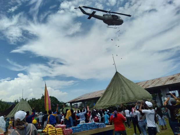 PH Air Force choppers drop toys, candies for Basilan kids