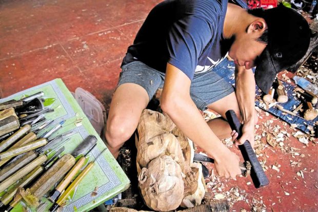 Young blood strengthens Paete wood carving tradition