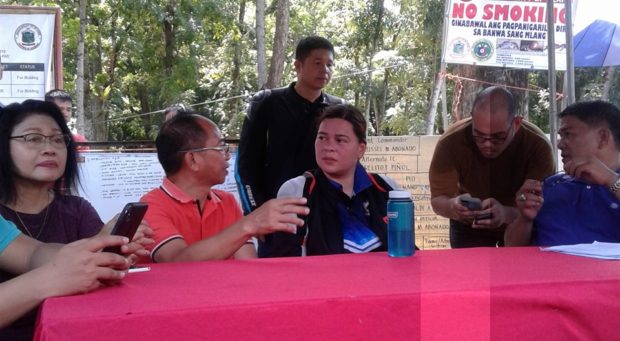 Sara Duterte visits quake-hit Cotabato towns, extends aid Davao City Mayor Sara Duterte receives updates from M’lang Mayor Russel Abonado and Vice Mayor Lito Piñol (left in red) during her visit in the town Friday, Nov. 1. (Photo by Edwin O. Fernandez)