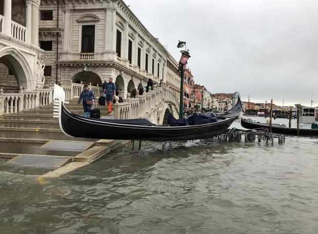 Gondola on bike rack in Venice