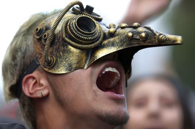 Masked anti-government protesters in Colombia