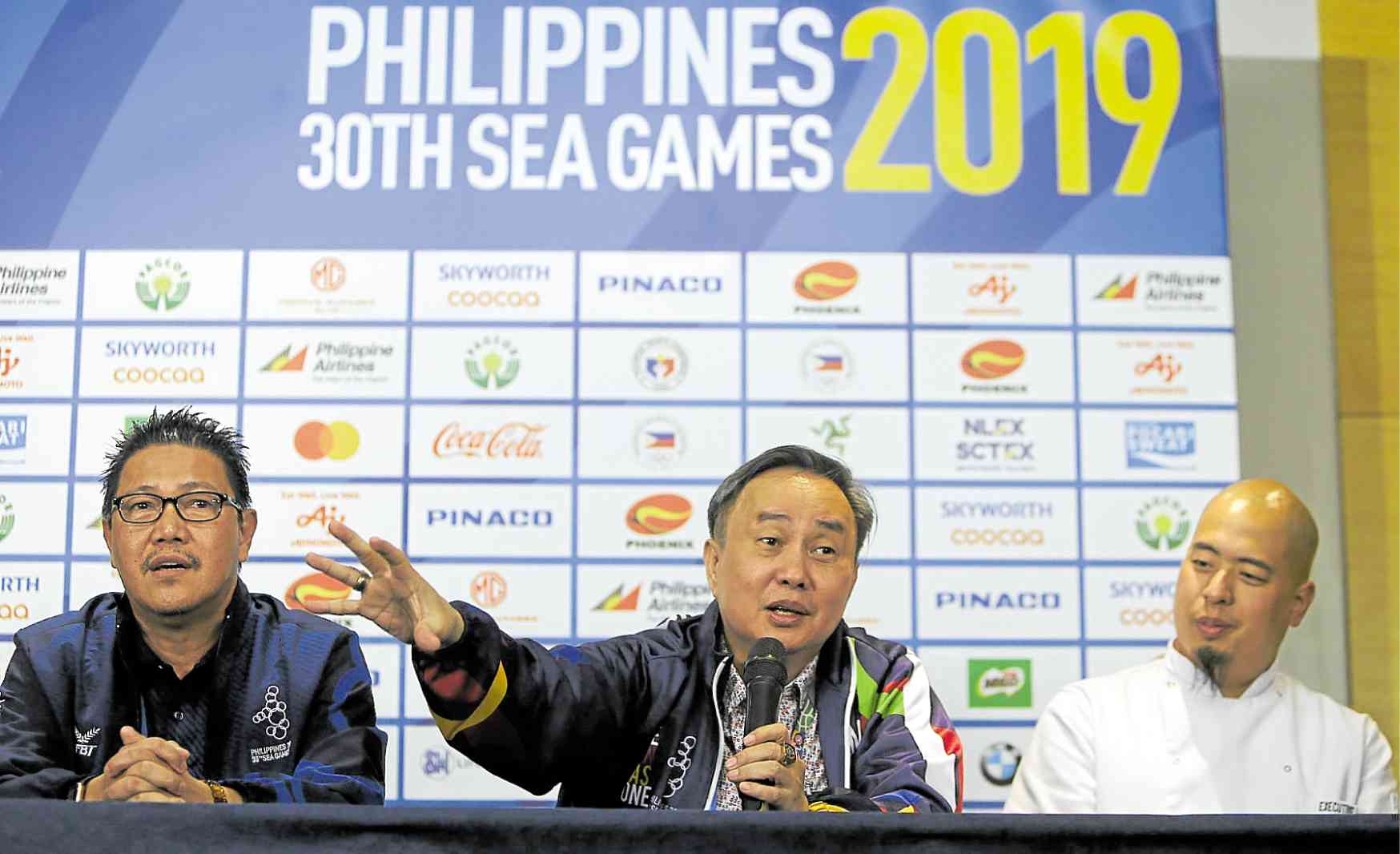 Ramon Suzara (left),COO of the Philippine Southeast Asian GamesOrganizing Committee, and Abraham Tolentino 