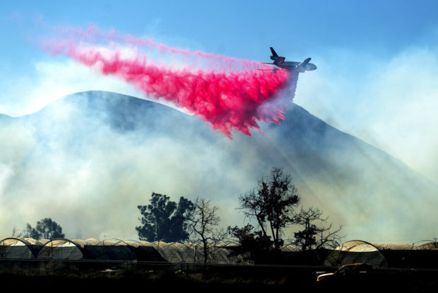 California firefighters struggle with big wildfire