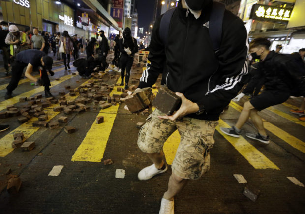  Hong Kong protester appears shot by police in online video