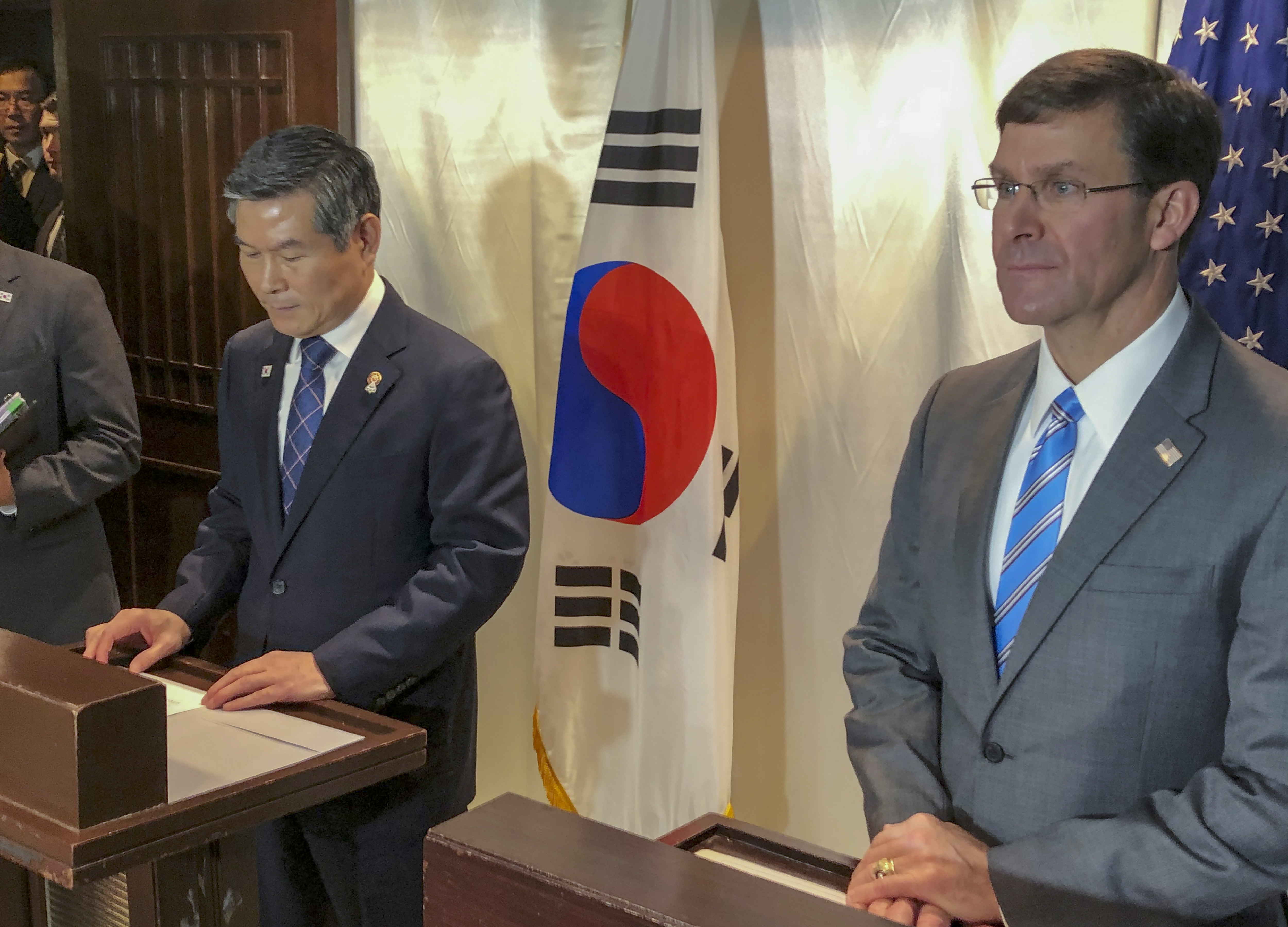 U.S. Defense Secretary Mark Esper, right, and South Korea defense Minister Jeong Kyeong-doo attend a press conference in Bangkok, Thailand, Sunday, Nov. 17, 2019. Esper and his South Korean counterpart announced Sunday that U.S. and South Korea are postponing a joint military air exercise that North Korea has criticized as provocative. (AP Photo/Robert Burns) kim jong un north korea