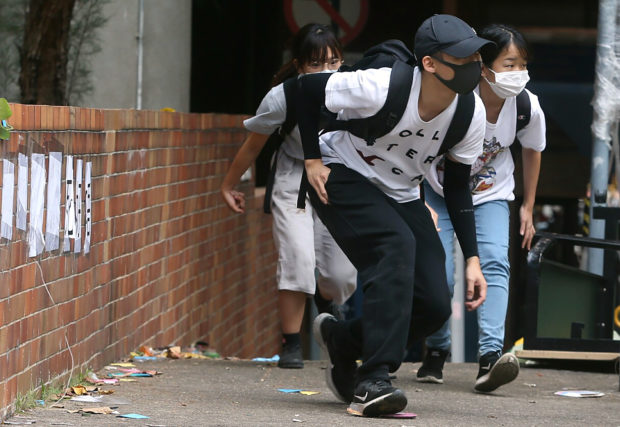 Criticism of Hong Kong mask ruling seen as hint from China