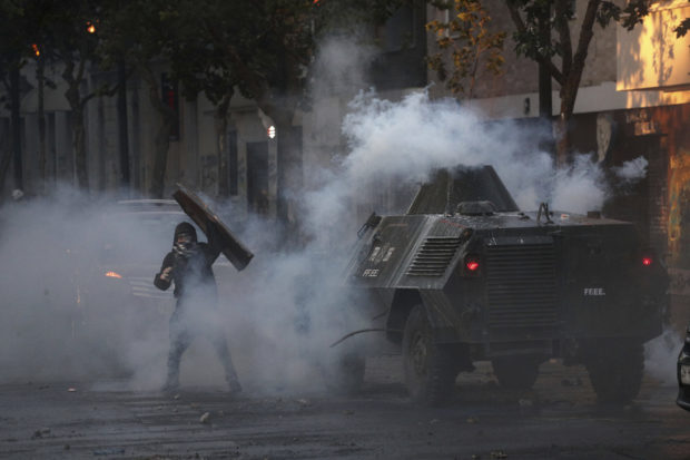 Chilean police suspend use of pellet guns against protesters